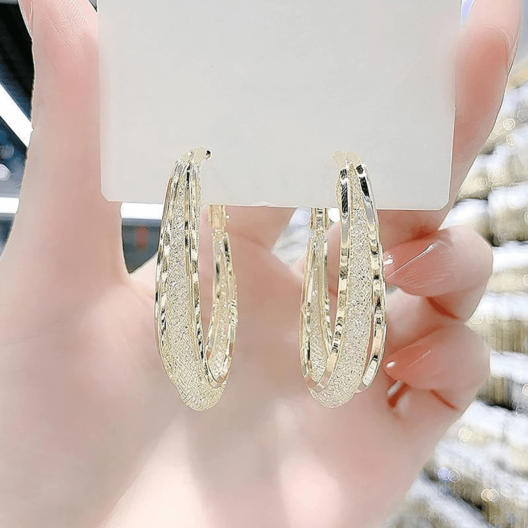 Par De Aretes Ovalados Con Tejido De Malla - Muy Moderna Uruguay