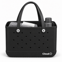 Bolso CLOUD L negro de EVA, 48 × 22 × 32 cm, con toalla, termo y protector para ilustrar el tamaño; accesorios no incluidos
